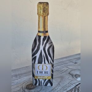 Dior-inspired wood decor piece with a zebra print design.